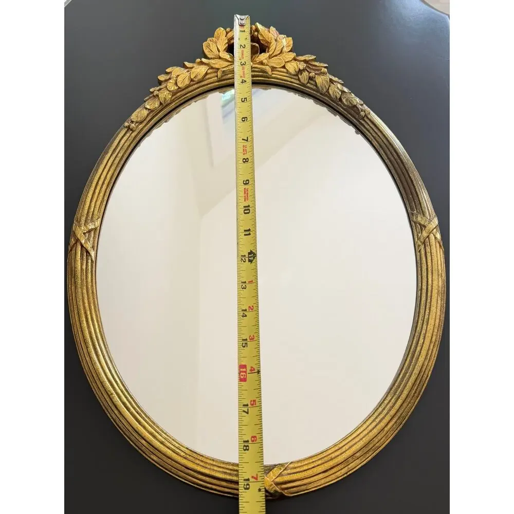 Vintage Hollywood Regency style mirror gold classic leaf wreath and ribbon crest